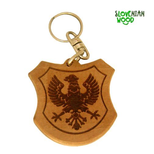 The coat of arms of the city. Custom designed pendant which fits the design of the engraving. Massive wood of local origin.
